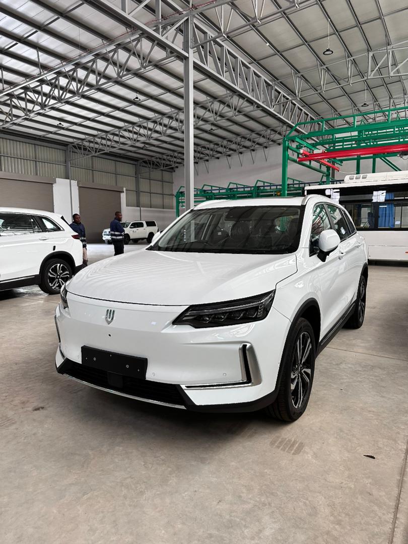 White electric crossover in assembly facility