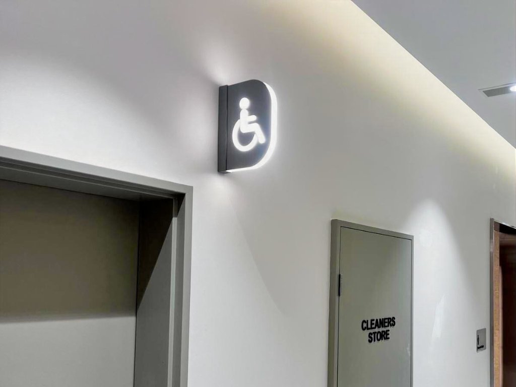 Westfield Bondi — L1 Amenities Blade Signage — photo 3: Illuminated Blade Signage, Braille & Tactile Signage, Wayfinding, Parents Room Wall Graphics