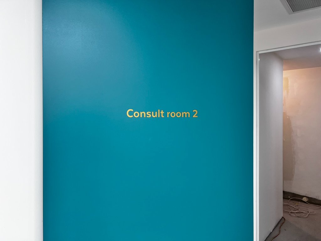 Shire Skin Cancer Doctors — photo 5: Halo-Illuminated 3D Logo, Brushed Bronze Lettering, Consult Room Wayfinding, Wall Signage