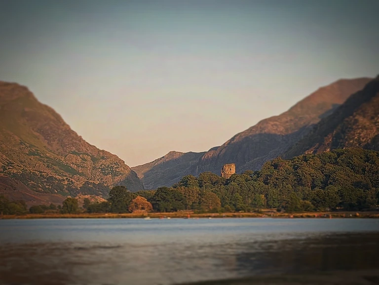 North Wales mountains meeting the sea at golden hour