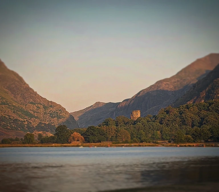 North Wales mountains meeting the sea at golden hour