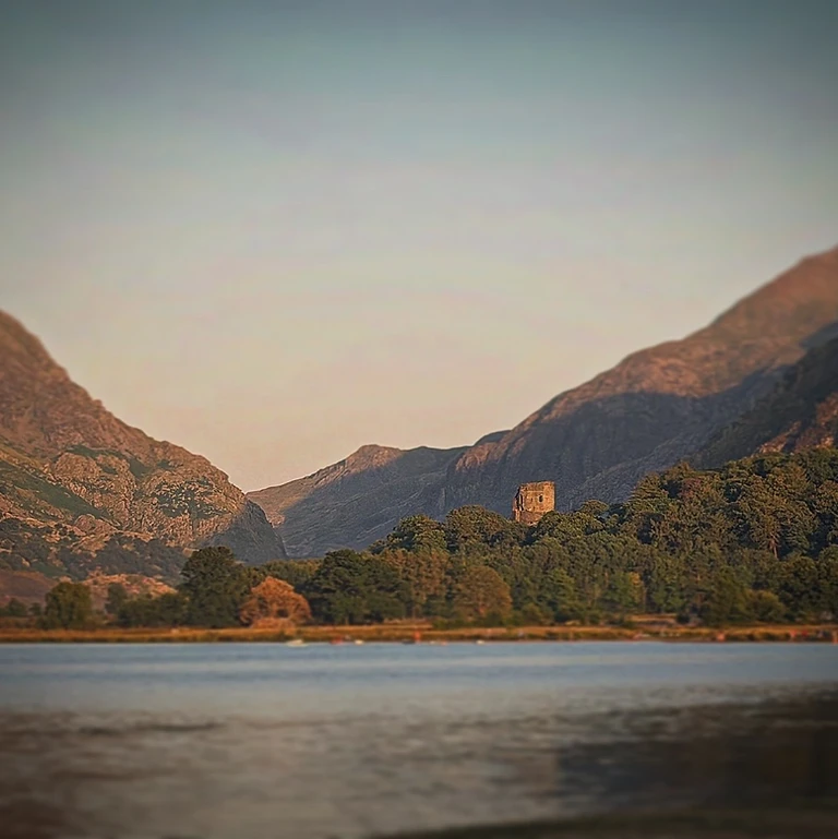 North Wales mountains meeting the sea at golden hour