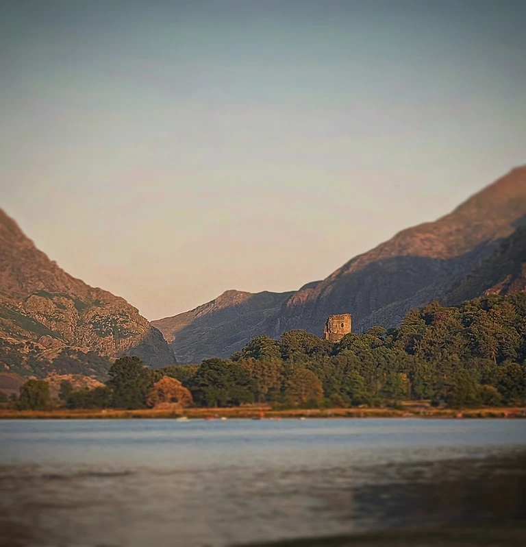 North Wales mountains meeting the sea at golden hour