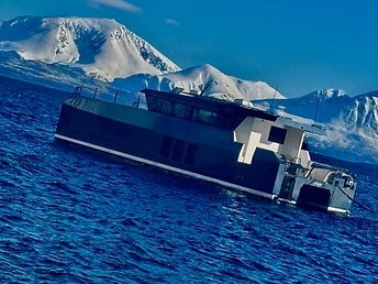 Your own vessel, your own route — a private cruise through the fjords of Northern Norway.