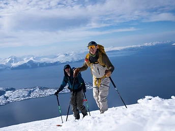 An exclusive combination of lodge luxury, private vessel and guided ski touring in the Lyngen Alps.