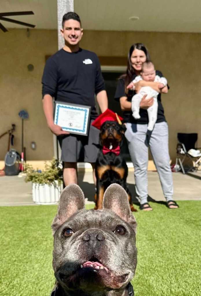 A family with their dog during the Bootcamp hand-off.