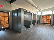 Bar seating booths, wood flooring