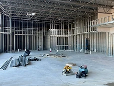 Retail shell interior with mezzanine framing