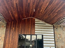 Finished wood and stone exterior entrance