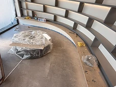 Curved display shelving, install in progress