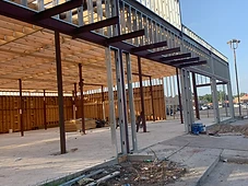 Steel frame shell with cantilevered canopy