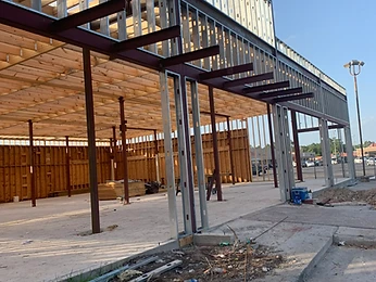 Steel frame shell with cantilevered canopy