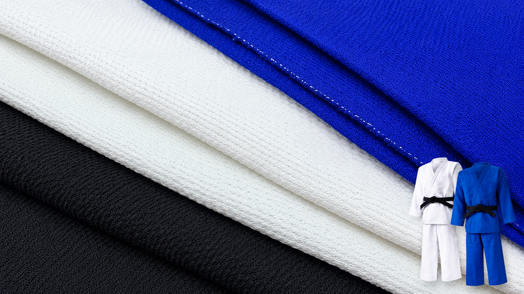 Layered black, white and royal blue martial arts fabric weave with finished uniforms