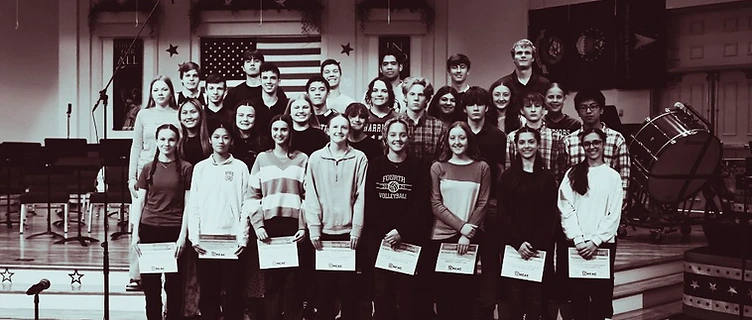 MACS students receiving choir festival recognition