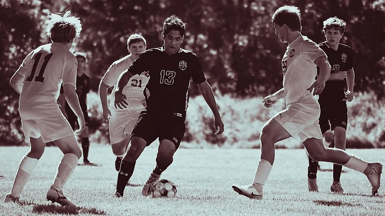 MACS soccer players competing on the field