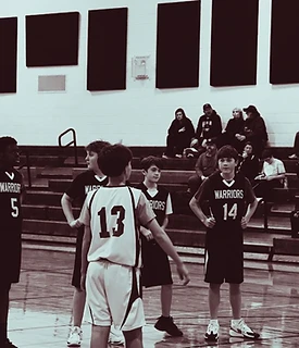 MACS junior high basketball players on the court