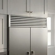 Finished refrigerator opening with Fridge Gap Co. vent cover