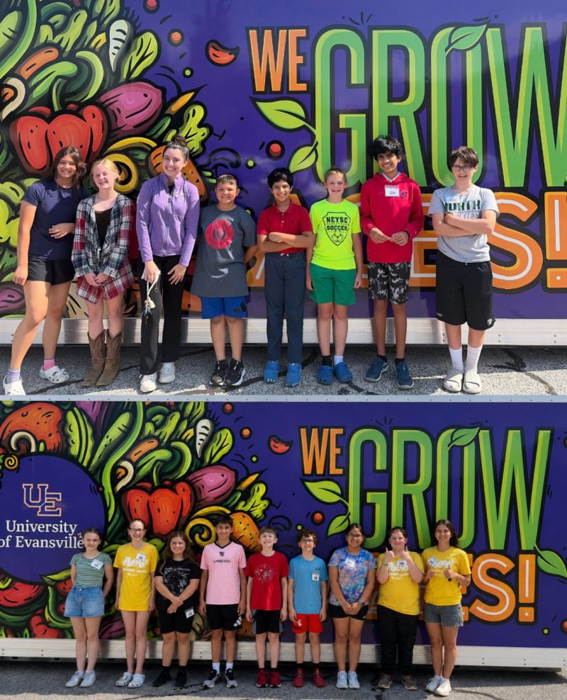 We Grow Aces team with the branded farm vehicle
