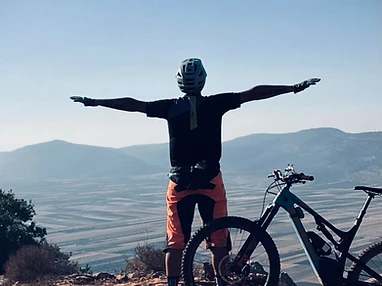 Mountain biker overlooking the valley