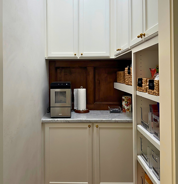 Custom butler's pantry with built-in cabinetry and shelving