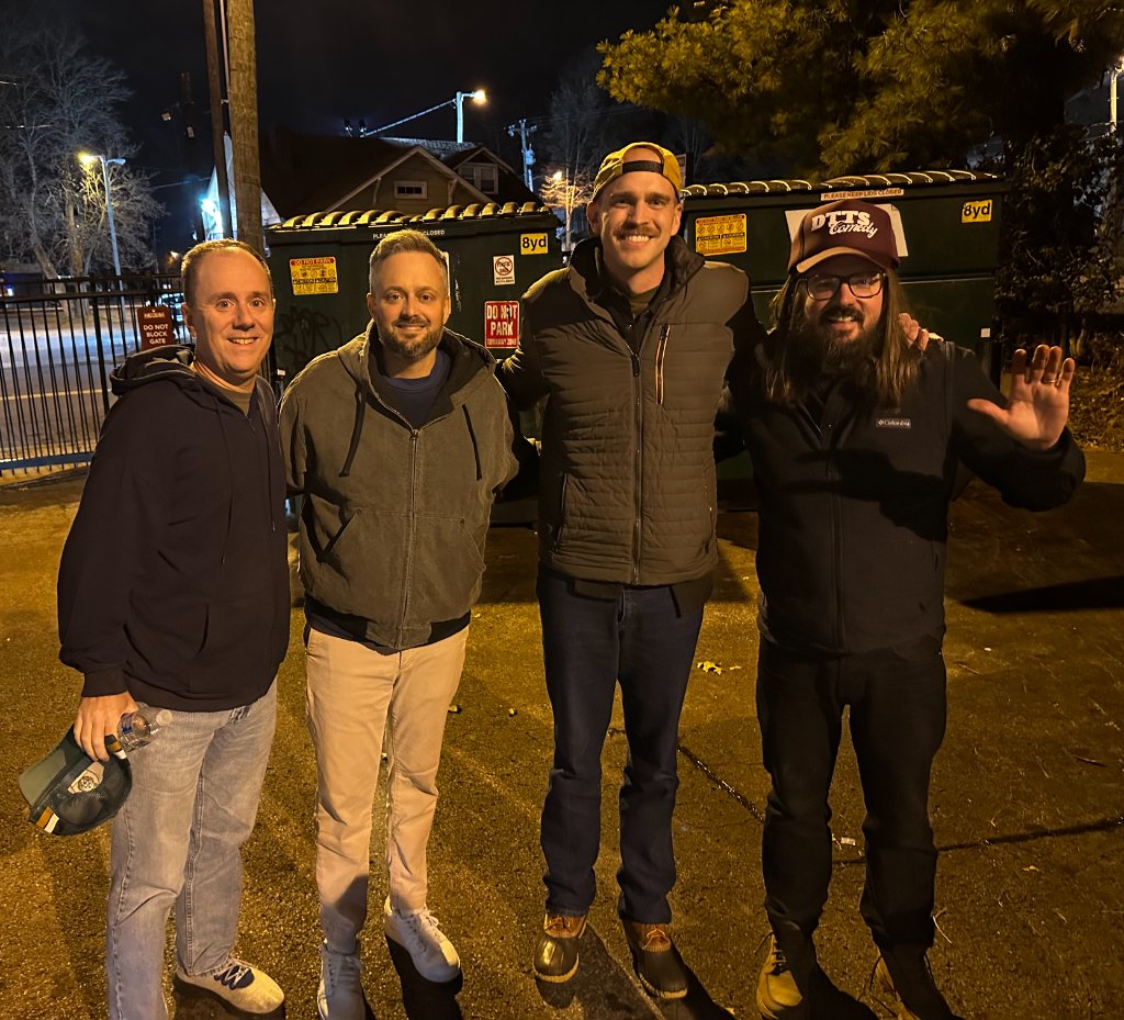 Scott Bedgood with comedians backstage after a show