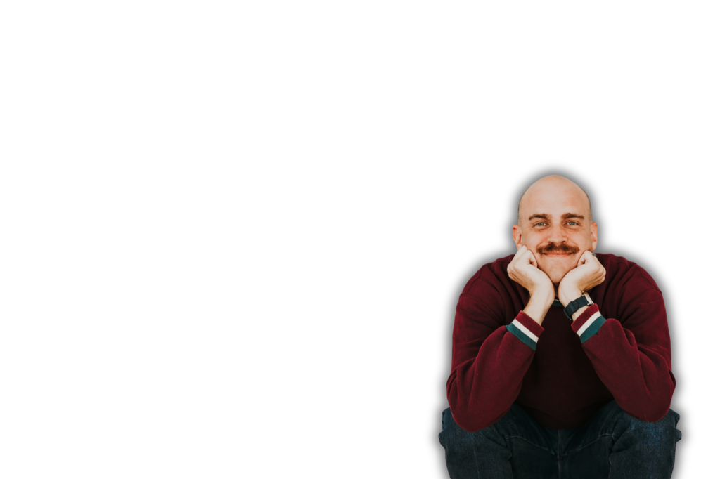 Scott Bedgood leaning forward, resting his chin on his hands