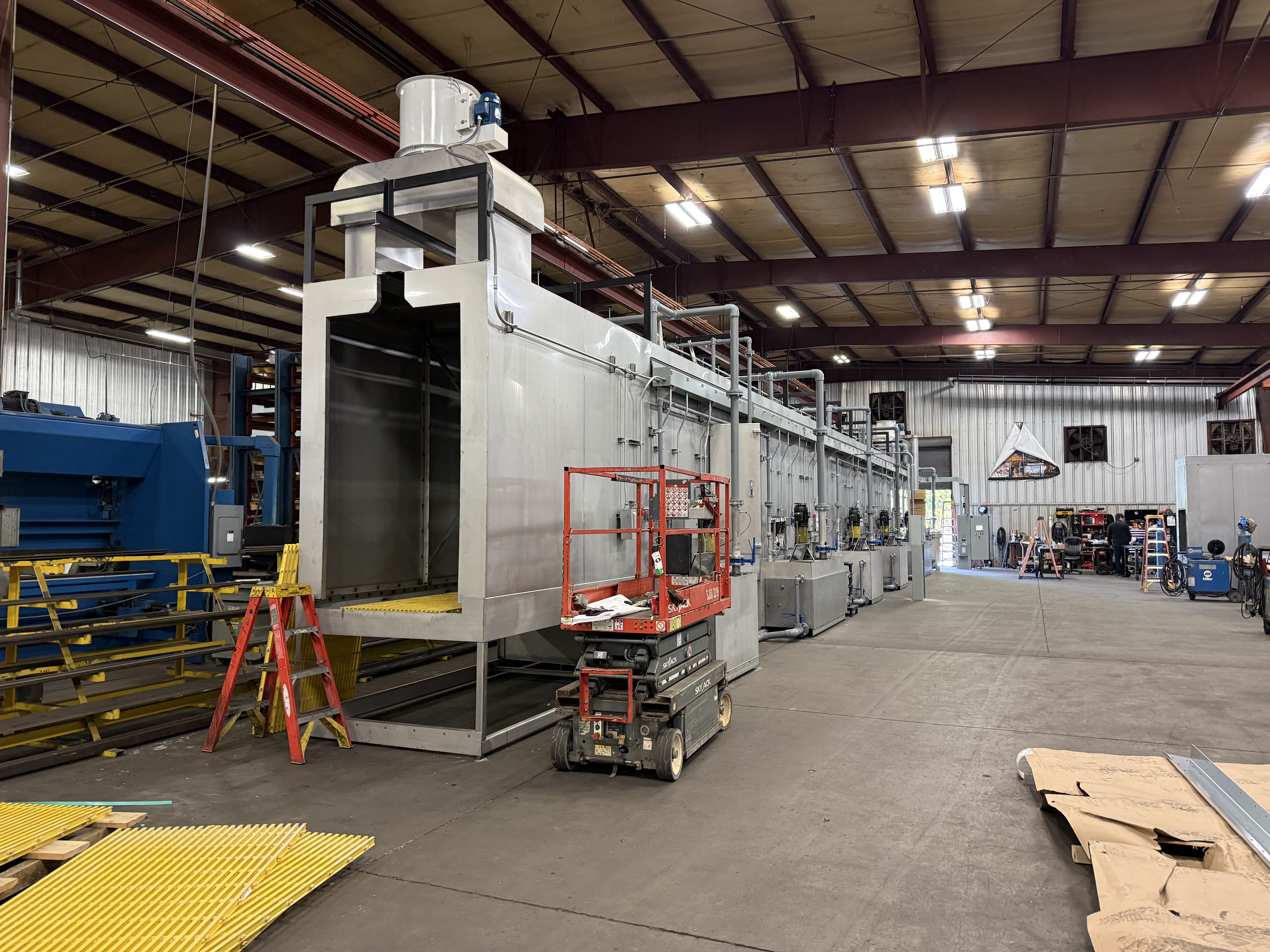 Liquid pretreatment tanks and wash stages