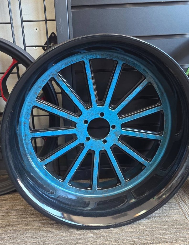 Blue Marble-Spoke Motorcycle Wheel