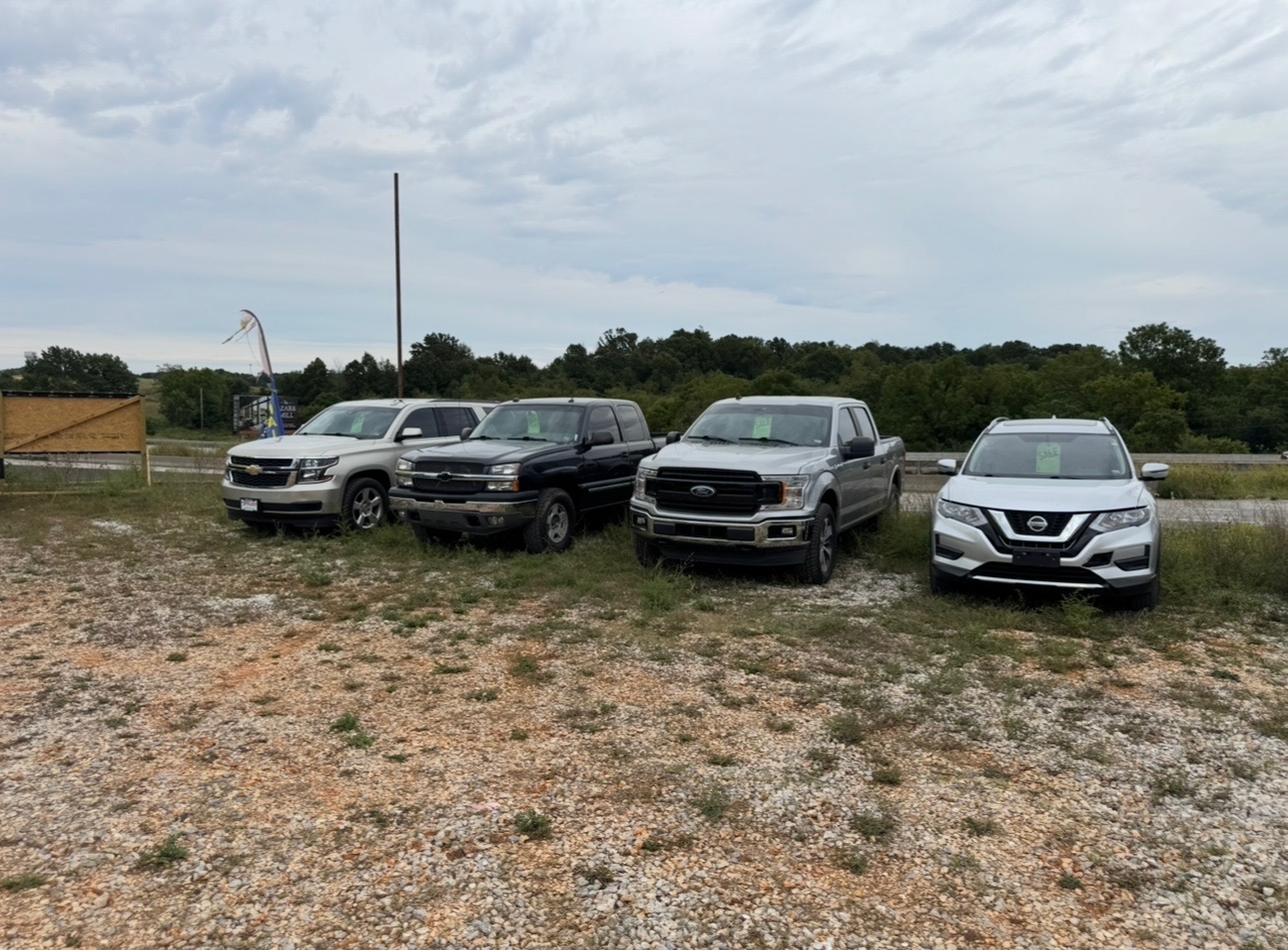 Midwest Auto Motors used car lot in Ozark, MO with vehicles parked on the lot