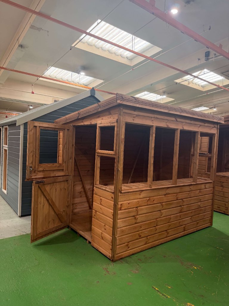 The Bath sun pent shed - front view with door in factory