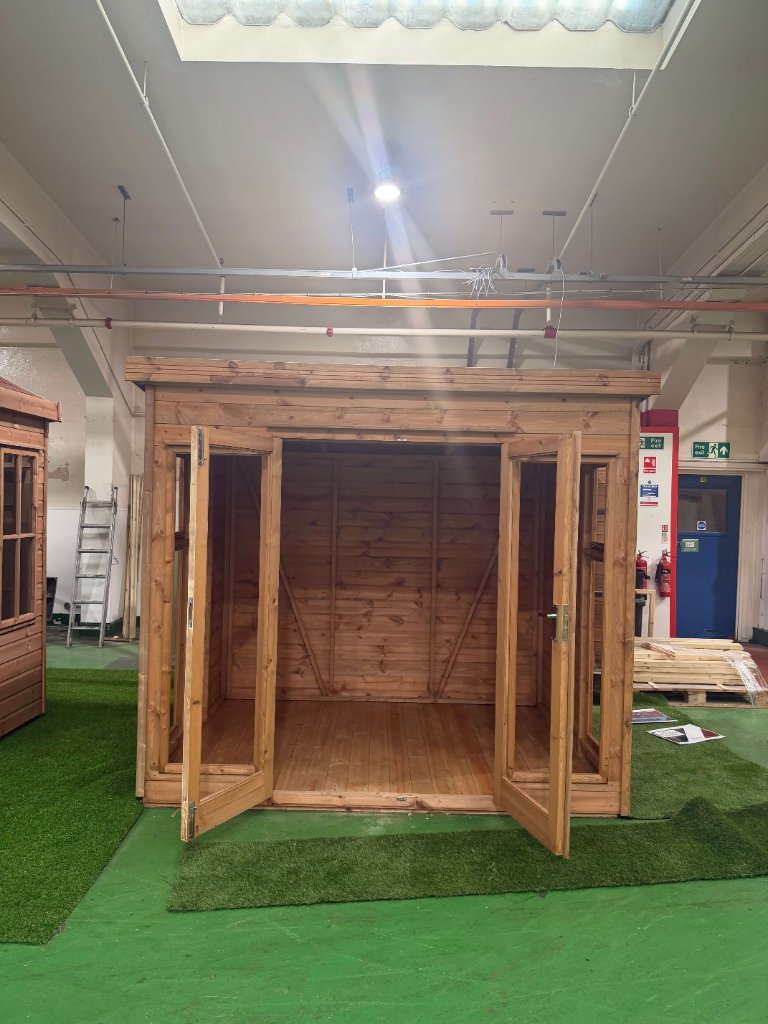 The Essex garden building - stained finish with doors fully open