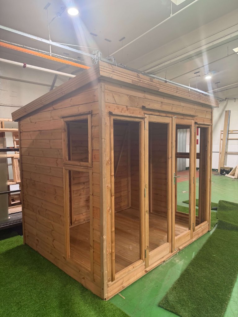 The Essex garden building - stained finish front-quarter perspective