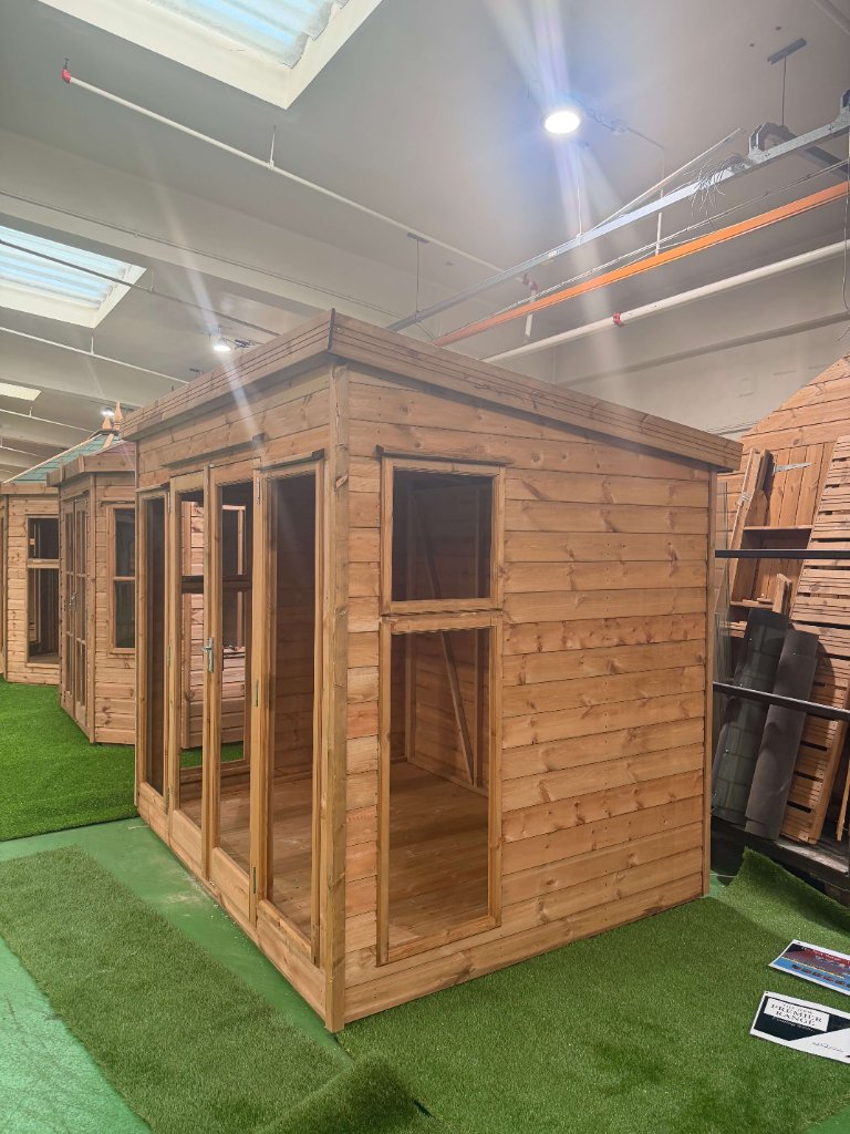 The Essex garden building - stained finish three-quarter angle