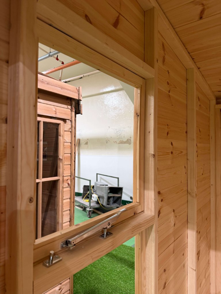 The Essex garden building - interior window stay mechanism close-up