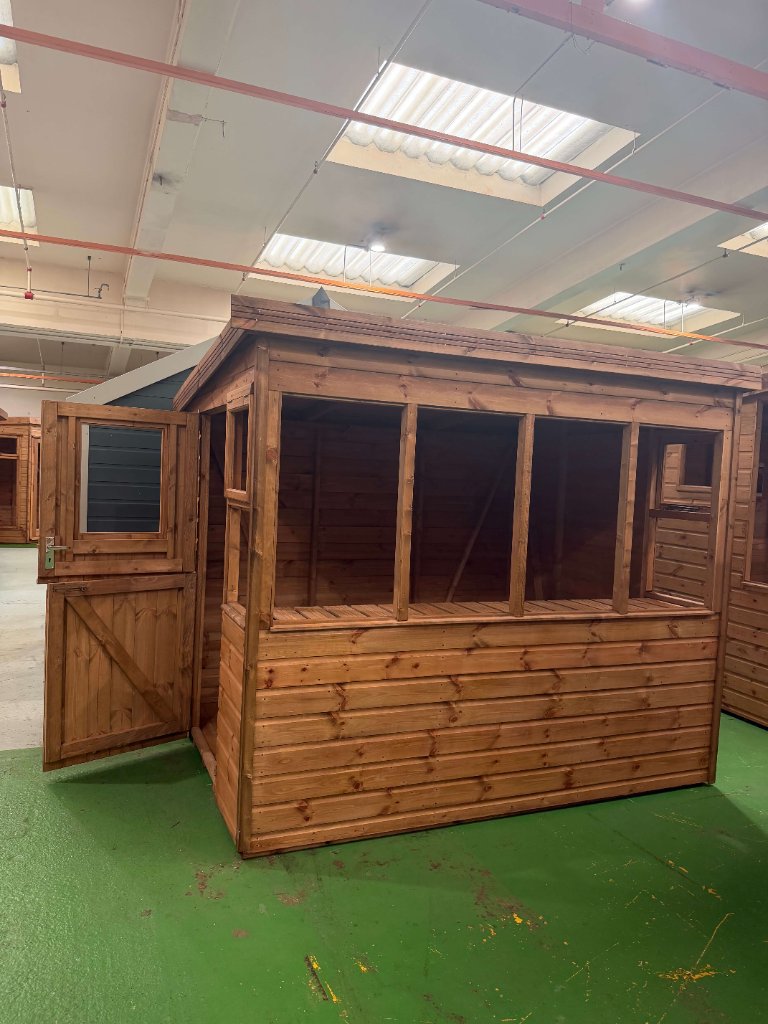 The Bath sun pent shed - stained finish three-quarter view