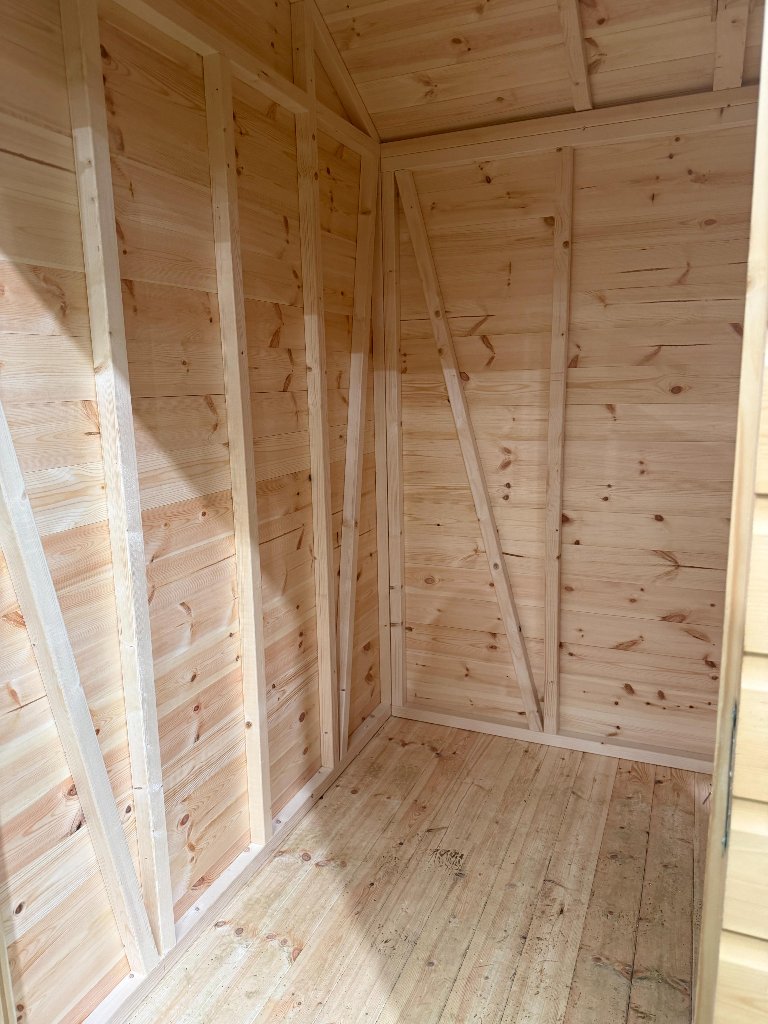 The Cumbria shed - interior back corner framing