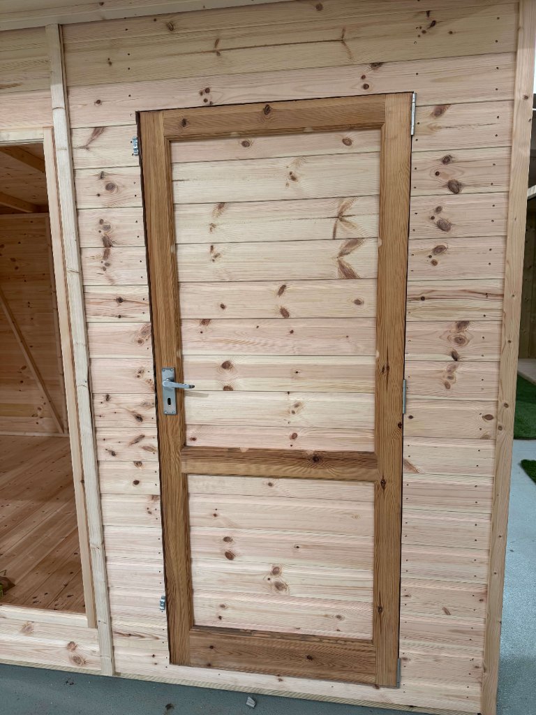 The Kent combination summerhouse - door and cladding detail