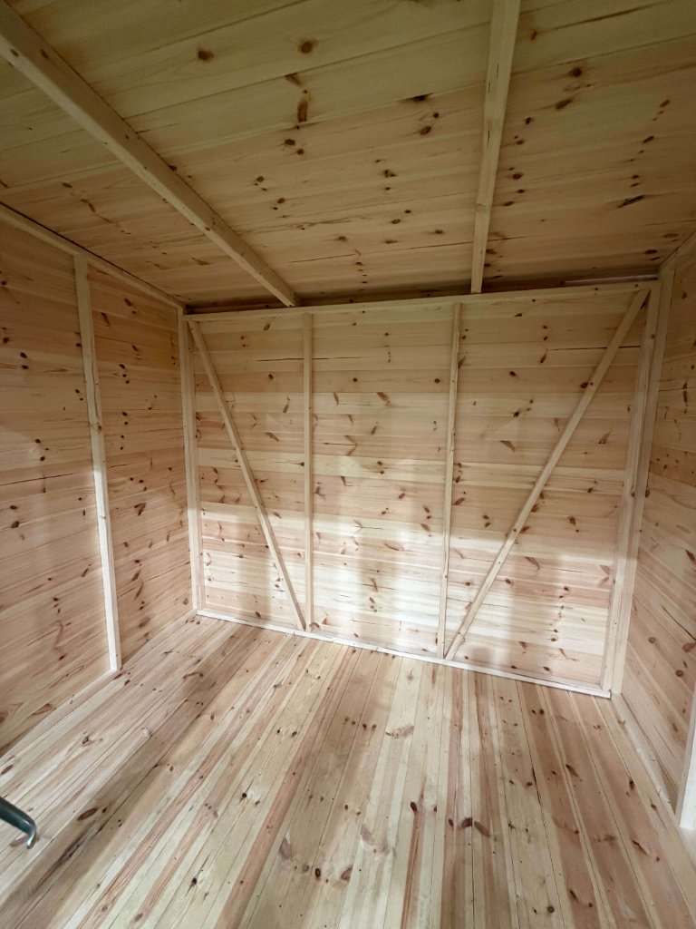 The Essex garden building - interior view with diagonal cross-bracing