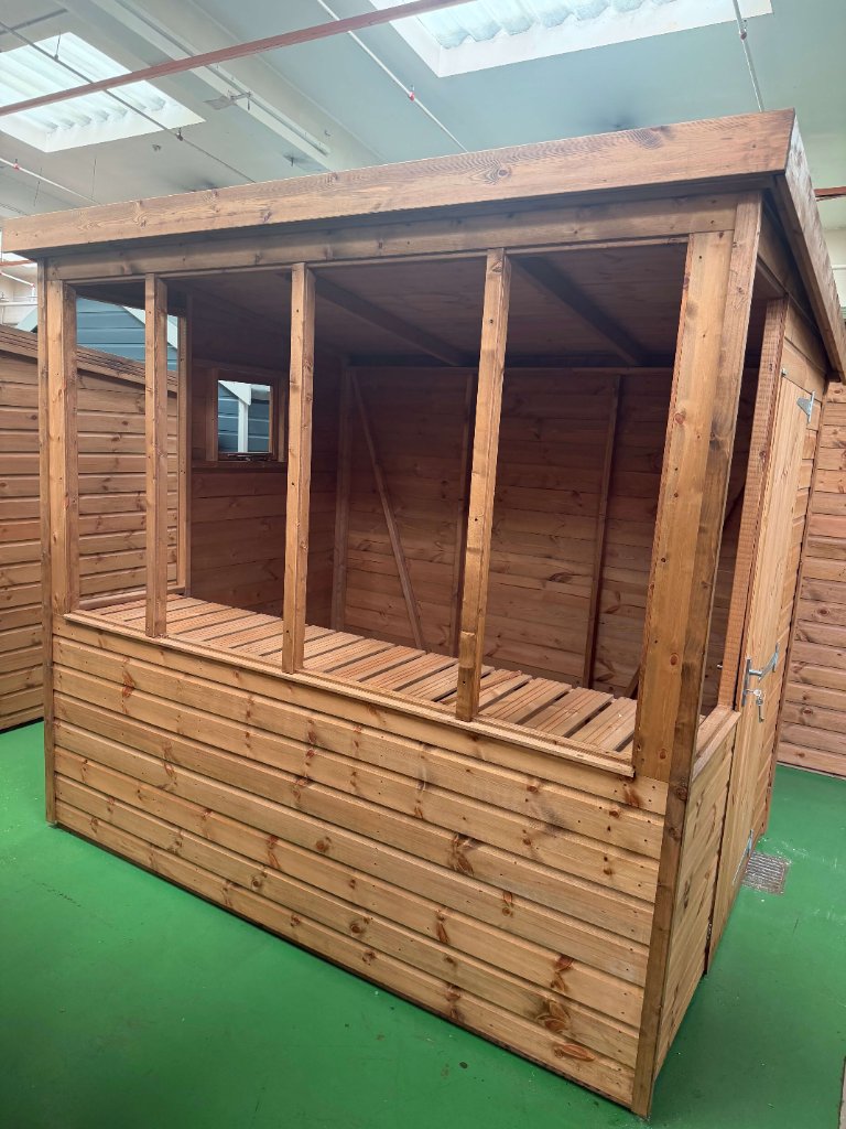 The Frome sunpent shed - three-quarter exterior view with open counter