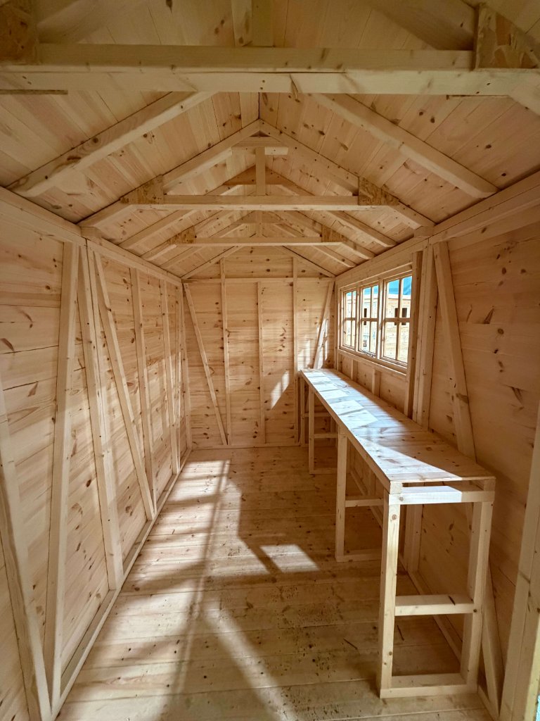 The Cumbria shed - interior with workbench and window