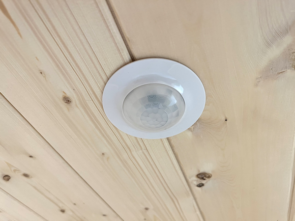 Light sensor to storage area