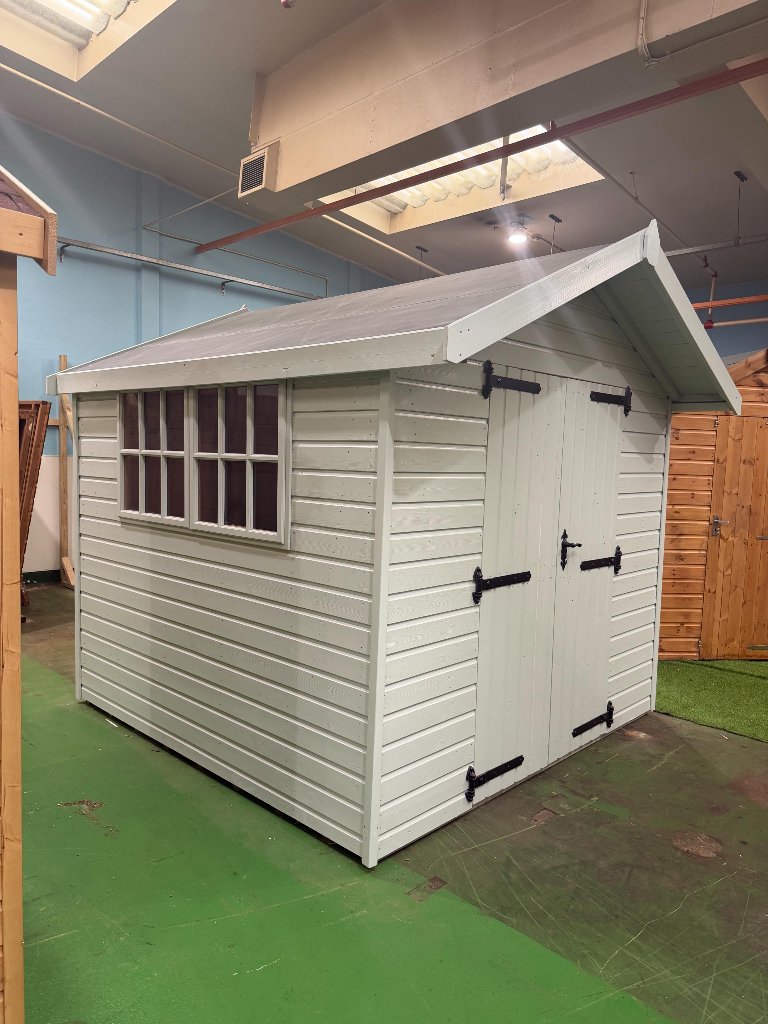 The Cumbria shed - sage green exterior corner view