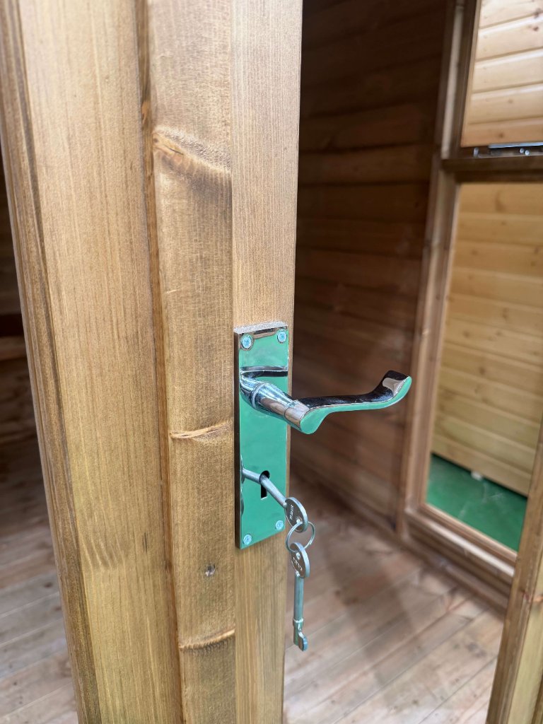 The Norfolk summerhouse - chrome door handle and lock detail