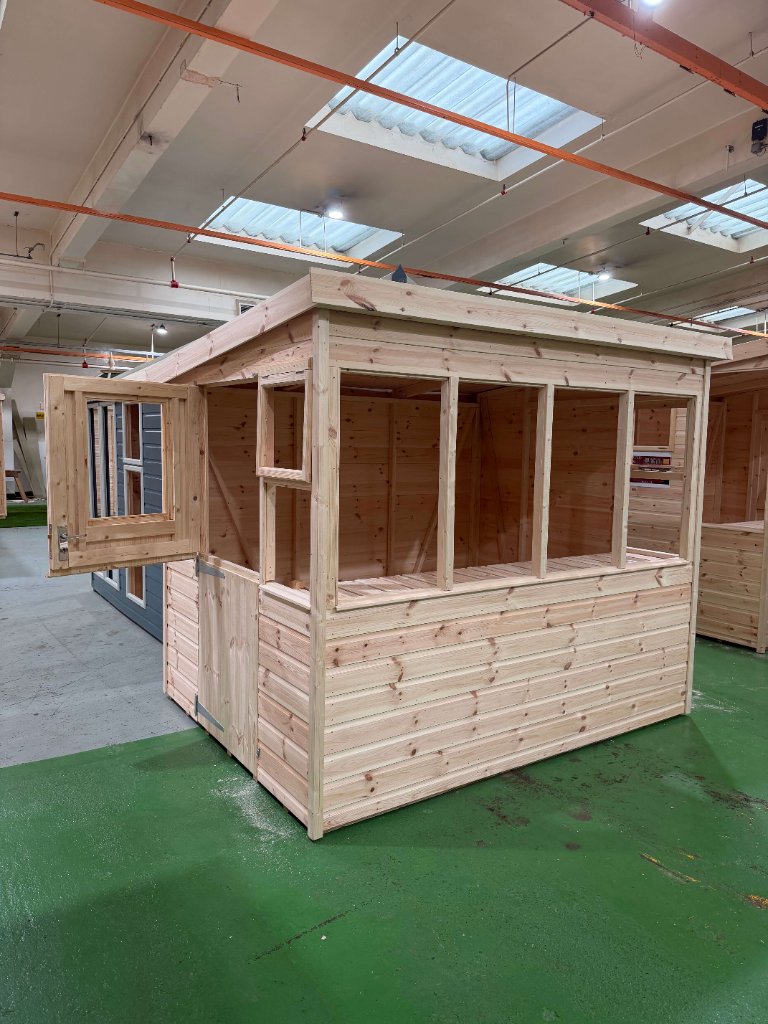 The Bath sun pent shed - three-quarter view with side door open
