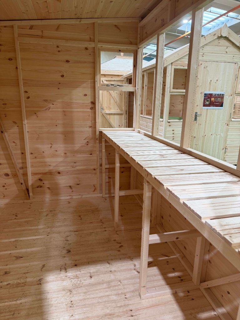 The Bath sun pent shed - interior view toward window wall