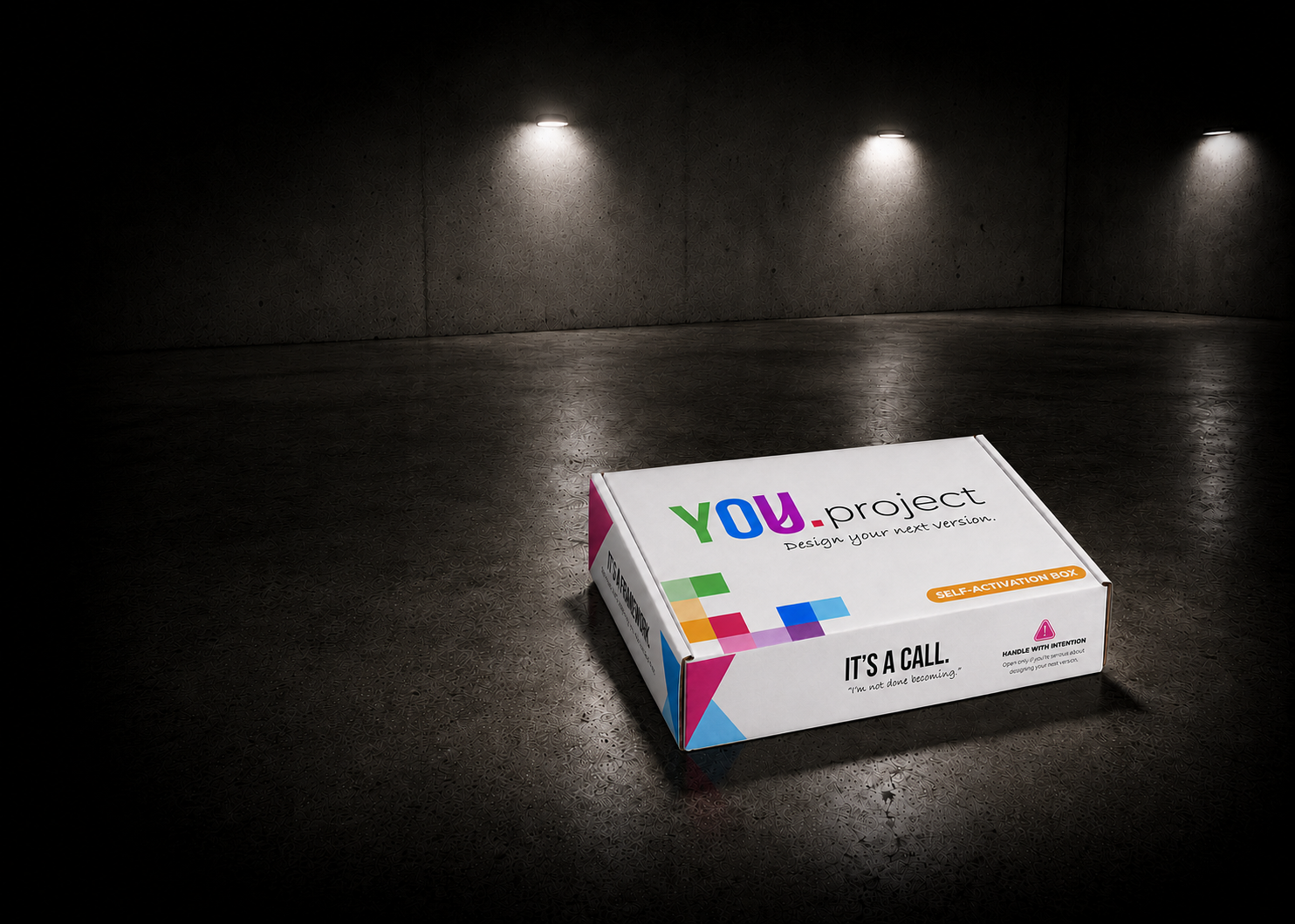 The YOU.project Self-Activation Box resting on a dark concrete surface under cinematic spotlights.