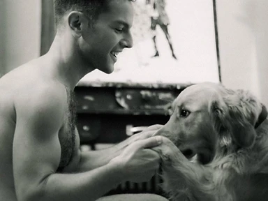 Ruben with a golden retriever in the studio