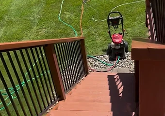 Deck stairs overlooking the yard