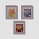 Three grey Game Boy Color cartridges for Zelda Links Awakening DX, Oracle of Ages, and Oracle of Seasons from the bundle