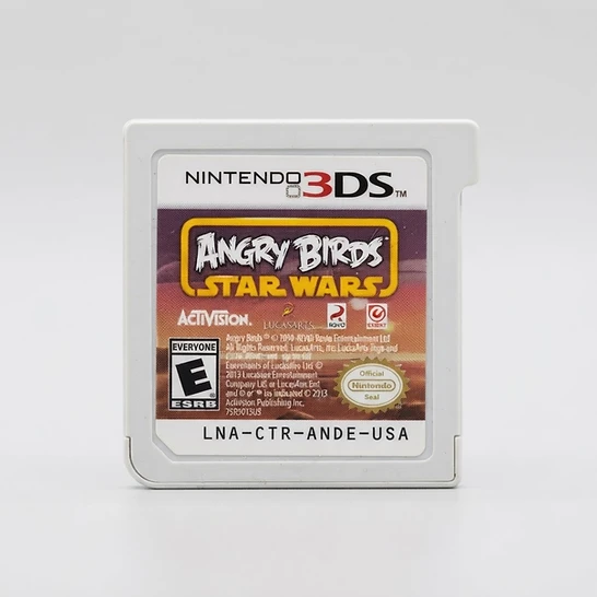 Angry Birds Star Wars Nintendo 3DS game cartridge label featuring the title logo and ESRB E rating on a sunset background